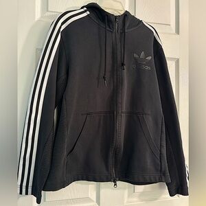 Black zip-up Adidas track jacket